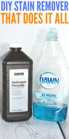 a bottle of water and a container of hydrogen on a table with the words diy stain remover that does it all