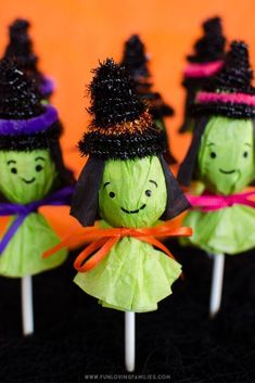 halloween treats made to look like witches on sticks