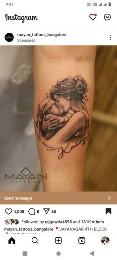 a woman's arm with a tattoo on it and an image of a man hugging her