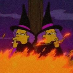 two cartoon characters dressed as witches in front of a fire