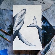 a watercolor painting of two humpback whales