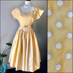 "1950s Polka Dot Dress in Yellow and White B Siegel Co Detroit Belted Drop Waist Full Skirt Flattering Fit Wonderful Silouette Classic Design This dress is really fabulous. It has a waist and belt combination that you don't see very often. The fabric is light and comfy. Amazing with a crinoline underneath.  Condition is very good. There are a few very small and light marks on the back. Almost look like pencil. See photos. The belt is in good condition. The buckle has discoloring which may be rus For Colored Girls, Love Hat, Dropwaist Dress, 50s Fashion, Very Interesting, Drop Waist, Polka Dot Dress, Dot Dress, Full Skirt