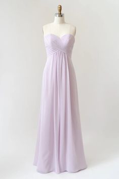 a bridesmaid dress on a mannequin