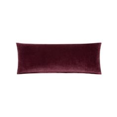 the burgundy velvet pillow is shown on a white background