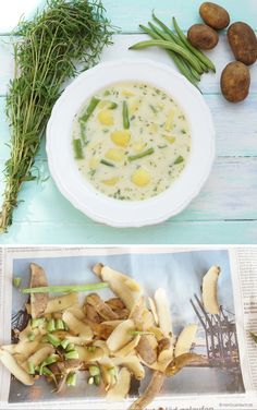 there is a bowl of soup on the table next to some vegetables and breads