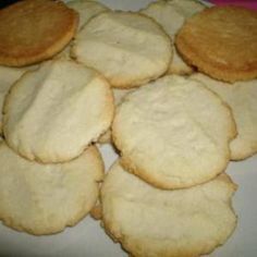 some cookies are sitting on a white plate