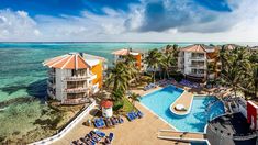 an aerial view of the resort and pool area