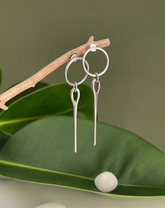 Surprise your girlfriend with AnAngelsHug's Pointy Silver Drop Spike Stud Earrings - the perfect blend of edgy and elegant. Welcome! 📌Please Kindly Note: The listing is for only one pair of earrings! 📌It is made of brass & zamak, which have been immersed in 999o sterling silver twice! 📌All pieces are subjected to an anti-allergic process (lead & nickel free). 📌These earrings are lightweight and easy to wear! 📏MEASUREMENTS: 👉Total length: 2.71" (6,90cm) 👉Spike length: 1.96" (5cm) 👉Cirlce Diameter: 0.79" (2cm) 👉Single Earring's Weight: 0.165oz (4,8gr) * Matching Earrings: https://anangelshug.etsy.com/listing/1718142882 👉Complete the look https://pagosmioshop.gr/ 🌟MORE FROM AN ANGEL'S HUG: https://anangelshug.etsy.com 📜CARE INSTRUCTIONS & SHOP POLICIES: https://www.etsy.com/shop/a Silver Earrings Drop, Surprise Your Girlfriend, Earrings Minimal, Earrings Dangling, Spike Earrings, Earrings Drop, Silver Drop Earrings, Single Earring, Matching Necklaces