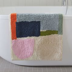 a bath mat with different colors on it