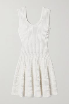 Alaïa's mini dress is made from stretch-knit with ribbed ottoman lines through the bodice and a padded, 3D-style weave at the skirt inspired by car tires. It has an elegant fit-and-flare shape with a scoop neckline that's mirrored at the back. It'll look so chic styled with Mary Jane flats. Knitted Mini Dress, White Flare Dress, Alaia Dress, Model Outfits, Fantasy Gowns, Ribbed Knit Dress, Ribbed Dresses, Glam Dresses, Knit Mini Dress