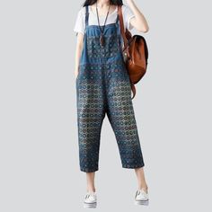 Bring the nostalgia home and show your unique fashion sense with this millennium-inspired sanded denim jumpsuit from our 2023 Spring-Summer Collection!Why You'll Fall In LoveThis vibrant jumpsuit is carefully crafted to create a established masterpiece. Its intricate painted print and sanded finish bring the Y2K era to life. with a loose silhouette that ensures comfort and ease of movement. Rich and radiant colors add a touch of edginess. while the delicate interplay of suspenders and buttons cl Retro Cotton Overalls With Relaxed Fit, Denim Blue Cotton Overall Jumpsuit, Summer Cotton Denim Jumpsuit With Bib Front, Casual Blue Cotton Denim Jumpsuit, Summer Relaxed Fit Jumpsuits And Rompers With Bib Front, Casual Blue Overalls For Summer, Casual Blue Summer Overalls, Denim Blue Bib Front Jumpsuit, Denim Blue Cotton Bib Front Jumpsuit