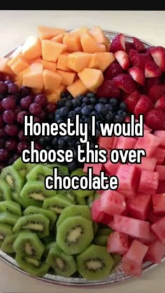 a plate full of fruit with the words honesty i would choose this over chocolate