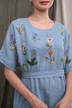 Colors & hand-embroidered patterns can be CUSTOMIZED or DESIGNED entirely to your specifications. It can be ANYTHING!  -------- A truly handmade product by GAIA. -------- A linen dress full of charm and feminine appeal: Soft natural linen, loose fitting with a waist belt for comfort and flexibility, perfect length for a graceful appearance, and especially the lovely hand-embroidered wildflowers arranged at random. Handmade in our studio to your own measurements and wishes.   ✓DETAILS - Unique, o Linen Designer Dresses, Linen Embroidery Dress, Embroided Dresses, Hand Embroidered Clothes, Folk Style Embroidered Linen Dress, Spring Embroidered Folk Linen Dress, Embroidered Linen Dress Hand Embroidery, Summer Folk Linen Embroidered Dress, Embroidered Wildflowers