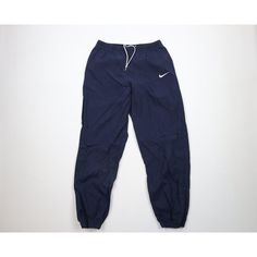 Vintage 90s Nike Mens XL Faded Mini Swoosh Nylon Joggers Pants Blue Mens Pants Both cuffs discolored. Stains front and back left leg. Loose seams back crotch area. Color faded. Distressing on cuffs Mens size XLarge Measurements are: 15 inches across the waist laid flat 30 inch inseam 40.5 inches from top to bottom Blue Nylon US Shipping is FREE, Canada is $15 and International is $24 Check out my other items in my store! PR2341 Nike Joggers Vintage, Vintage Nike Hose, Blue Vintage Nike, Blue Nylon Jogging Pants, Nike Hose, Vintage Nike Track Pants, Nike Blue Vintage Track Pants, Jogging Nike, Blue Pants Men