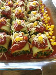 a glass dish filled with lots of different types of food on top of each other