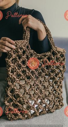 a woman holding a brown crocheted bag with buttons on it's handles