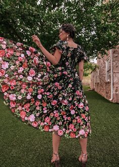 What a Lovely Thing a Rose Is The Rose Dress is a stunning piece that will transport you to a world of whimsy and romance. Pink roses and elegant ruffles cascade down the skirt, adding a touch of femininity and movement to every step. Runs true to size Smocked bodice Fully lined Elastic puff sleeves Square neckline Update: The 'Maxi' length has been updated to be 3" shorter than it was from our initial release of the Rose Dress. Photos show the updated version of the Rose Dress. Model Details Co Flowy Rose Print Floral Dress, Rose Flower Plus Size Dress, Spring Floral Embroidered Princess Dress For Dress-up, Feminine Pink Rose Print Dress, Modest Dresses Jessakae, Short White Dress Wedding, Knee Length Wedding Dress, Women Bride, Banquet Dresses