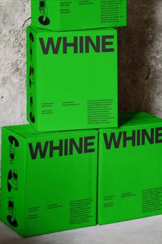 three boxes are stacked on top of each other with the words whine in black