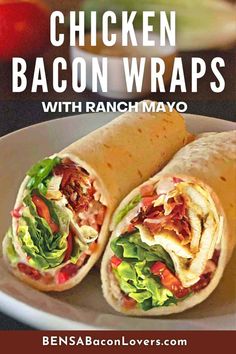 chicken bacon wraps with ranch mayo on a plate next to lettuce and tomatoes