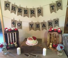 a table topped with a cake and candles