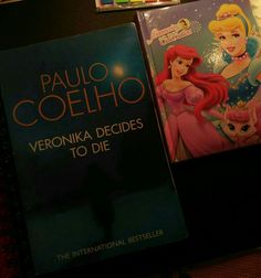 two books sitting on top of a table next to each other with the title'veronika decides to die '