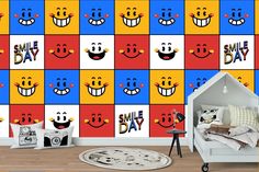 a child's room decorated with colorful wallpaper and smiling faces on the walls