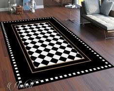 a black and white checkered area rug in a living room