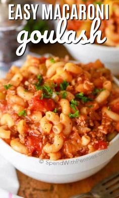 an easy macaroni goulash recipe in a white bowl with the title above it