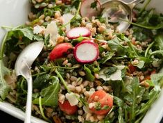 a salad with radishes and other vegetables in it