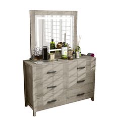 a dresser with a mirror and bottles on it