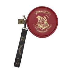 Unleash your inner wizardry with this officially licensed Harry Potter round coin purse. Adorned in rich burgundy, the coin pouch features a foil-printed Hogwarts crest that adds a touch of magic to your everyday essentials. It also includes a delightful rubber charm shaped like the iconic Hogwarts acceptance letter, adding a whimsical touch to your accessory collection. With a convenient polyurethane wrist strap and measuring at a compact 5.12" x 5.12", this coin purse is not only stylish but p Harry Potter Coins, Harry Potter Purse Target, Harry Potter Mini Backpack, Hogwarts Keychain, Harry Potter Crossbody Bag, Target Purse, Hogwarts Acceptance Letter, Hogwarts Crest, Travel Set