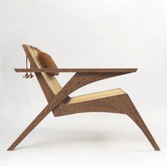 a wooden chair that has been designed to look like an airplane