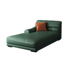 a green leather chaise lounge with an orange pillow