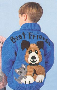 two children wearing sweaters with dogs on them