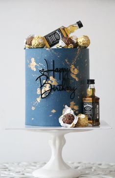 a birthday cake decorated with chocolates and confections