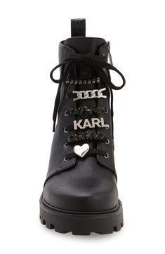 A durable lugged sole grounds an edgy combat boot sweetened by imitation pearls, shiny crystals and gleaming logo hardware. 1 1/2" heel 5 3/4" shaft; 10 1/4" calf circumference Cushioned footbed with arch support Synthetic upper, lining and sole Imported Shiny Crystals, Combat Boot Outfit, Womens Combat Boots, Combat Boot, Karl Lagerfeld Paris, Boots Outfit, Black Fits, Arch Support, Karl Lagerfeld