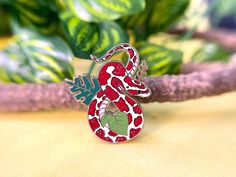 Celebrate your love for snakes with this crimson corn snake pin! ✦ Hard enamel ✦ Shiny gold metal ✦ Screen printed details ✦ 1.25 inches ✦ 2 Posts for extra security ✦ Rubber backings ✦ Back stamped for authenticity Red Enamel Pin As Gift, Red Enamel Pin Gift, Red Enamel Pin For Gift, Red Enamel Pins For Gifts, Red Snake-shaped Jewelry For Gifts, Red Snakes, Corn Snakes, Snake Red, Lapel Pins Suit