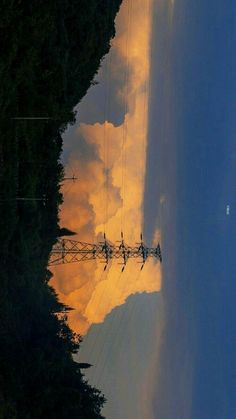 the power lines are reflected in the water