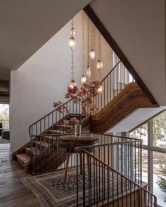 a stair case with lights hanging from it