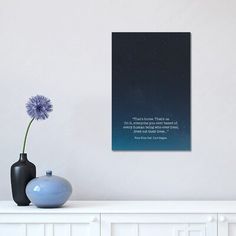 a vase with a flower and a quote on it