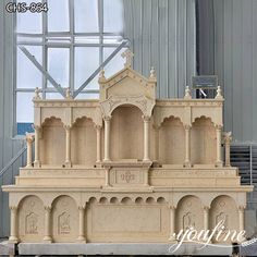 a model of a building made out of clay