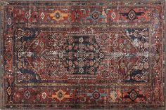 an old rug with many different colors and patterns