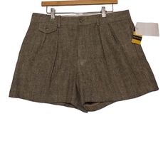 Experience The Perfect Blend Of Comfort And Style With These Ralph Lauren Rugby Dewitt Herringbone Shorts. The Linen Blend Material Ensures A Relaxed Fit, Making It Suitable For Travel And Casual Occasions. The Pleated Front And High-Rise Design Add A Classic Touch To The Shorts, Which Are Available In Size 10 And A Beautiful Shade Of Brown. These Shorts Feature A Zip Closure And Pockets, Making Them Both Stylish And Functional. Perfect For Summer, Fall, And Spring, They Are A Must-Have For Any Ralph Lauren Bottoms With Built-in Shorts For Summer, Ralph Lauren Summer Bottoms With Built-in Shorts, Classic Ralph Lauren Bottoms For Spring, Ralph Lauren Summer Pants, Classic Ralph Lauren Bottoms With Pockets, Fitted Ralph Lauren Bottoms For Summer, Shade Of Brown, Ralph Lauren Rugby, Ralph Lauren Shorts