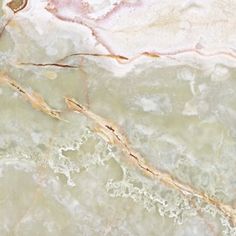 an abstract marble background with gold and white colors