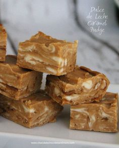 several pieces of peanut butter fudge stacked on top of each other