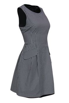 Go for a classic springtime look with this gorgeously gingham frock! Perfect for wearing with espadrille flats or your favorite sandals when you want some light and girly style for those sunny days. Size 10 59% Polyamide, 41% Nylon Tent, shift silhouette Rounded neckline Pockets at hip Zippered back Fully lined Waist 32" Bust 34" Total length 35" Casual A-line Plaid Dress, Casual Plaid Dress For Spring Picnic, Classic Gingham Dress, Fitted Preppy Plaid Dress For Spring, Preppy Spring Workwear Dresses, Casual Fitted Houndstooth Dress, Preppy Plaid Dress For Spring, Casual Gingham Plaid Dress For Spring, Preppy Spring Plaid Dress