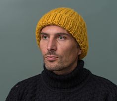 "This  is our beautiful \"Woolly Ragwort\" 100% wilderness wool Fisherman Style Hat. This exquisite wool is from the Falkland Islands where the sheep roam wild across undulating land. They are not dipped in chemicals nor do they suffer the painful method of mulesing. The wool is extremely soft & light. It is not itchy & non-static as it has zero acryllic properties in it. The label is made from cork which come's from the bark of an Cork Oak tree!  The whole item can be disposed off in the compost or recyling without any worry that you are contributing to plastics in the oceans!  It is a chunky wool knit and so is a thick hat, super for keeping your head cosy warm. It has extra length to ensure your ears can be covered when the wild winds blow. As it is 100% wool it will pill over time, but Yellow Knitted One-size-fits-most Hat, Hand Knitted Yellow Beanie For Winter, Mustard Wool Hat, Hand Knitted Yellow Beanie Hat, Yellow Knitted Beanie, One Size, Fisherman's Hat, Wooly Hats, Super Chunky, Chunky Wool