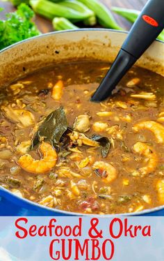 seafood and okra gumbo soup in a blue pot with a black ladle