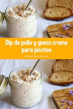 two jars filled with food sitting on top of a table next to slices of bread