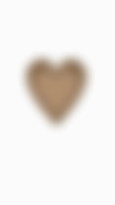 a brown heart shaped object on a white background